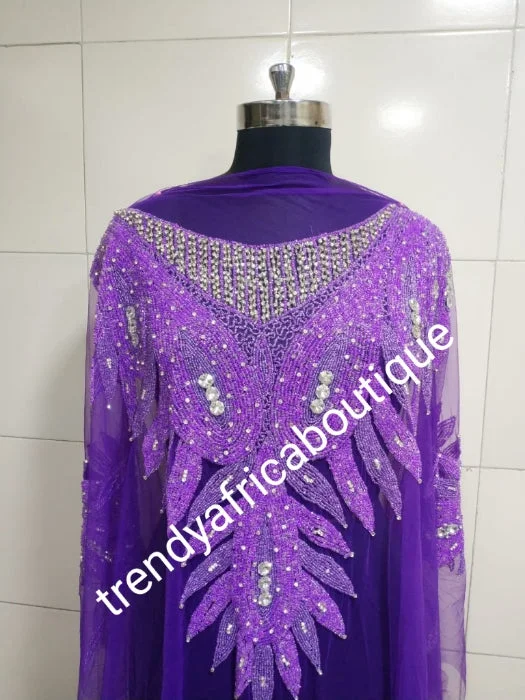 Purple Heavily-beaded net for making blouses. Popularly use by Igbo/Delta/edo women for making modern blouse for big Occasions. Comes in 1.8yds lenght already design for your beautiful blouse Soft Modal Blouse