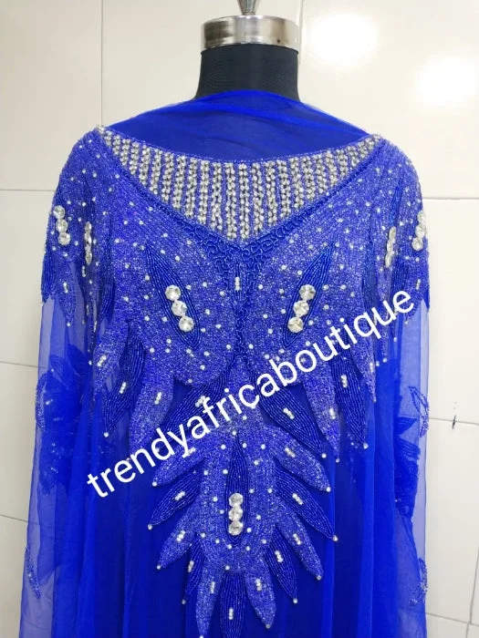 Royal blue Heavily-beaded net for making blouses. Popularly use by Igbo/Delta/edo women for big Occasions. Comes in 1.8yds lenght already design for your beautiful blouse Feminine Ruffle Blouse